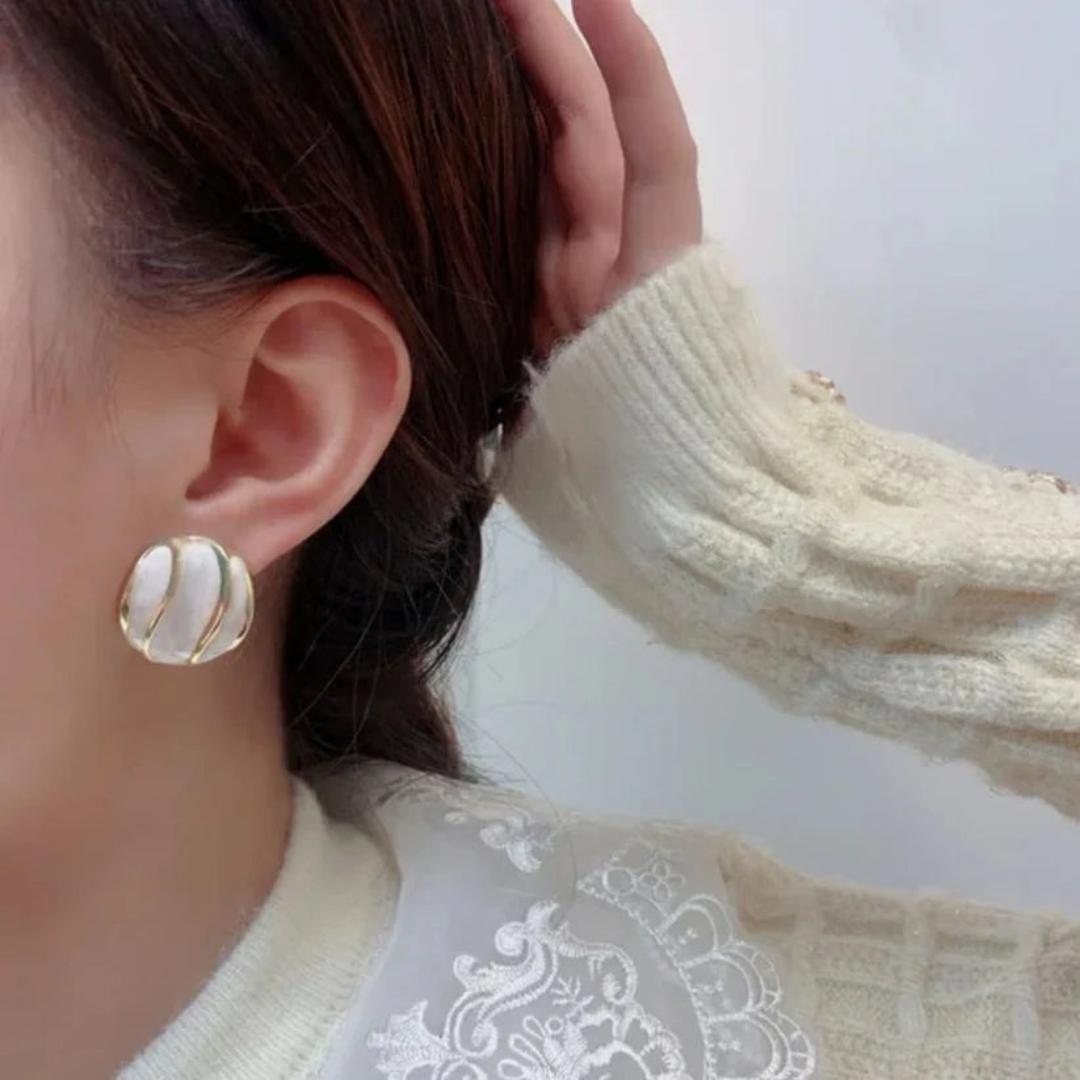 white gold leaf stud earrings