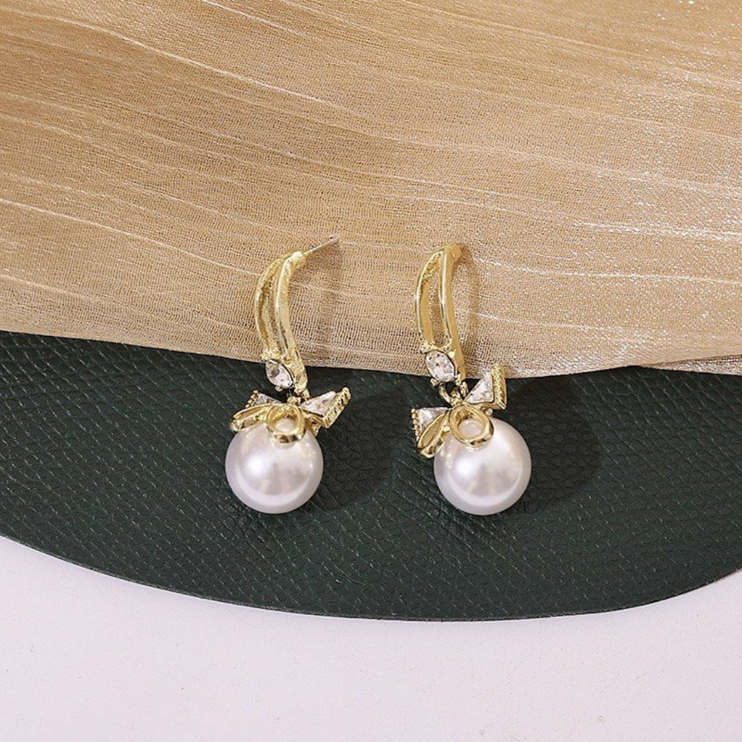 Cute Hanging Bells Bow Stud Pearl Earrings – Elegant & Trendy