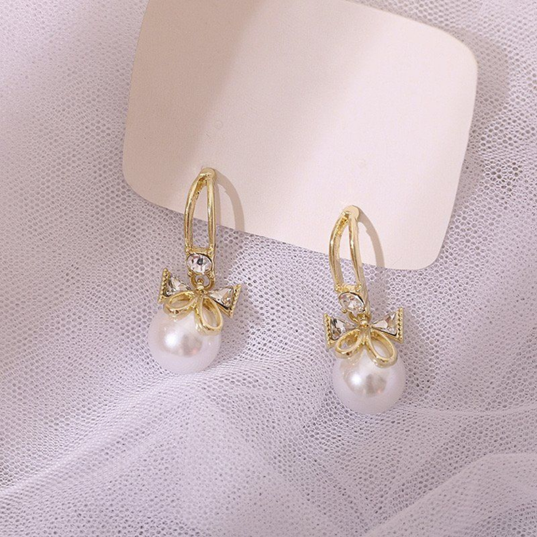 Cute Hanging Bells Bow Stud Pearl Earrings – Elegant & Trendy